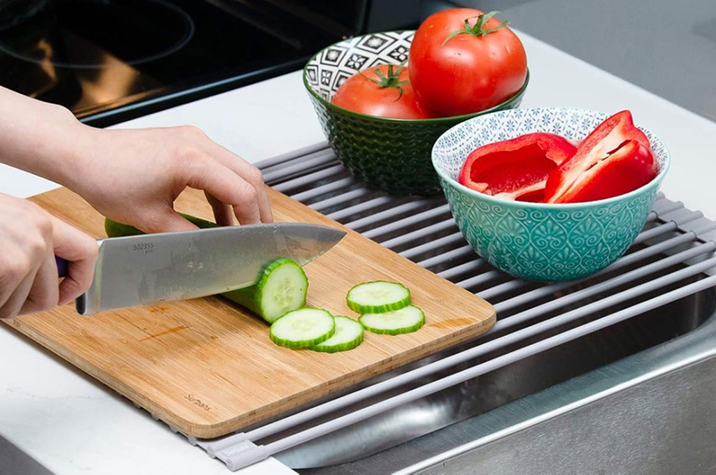 Roll up dish drying rack over kitchen sink